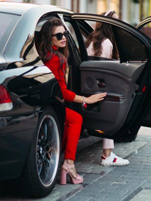 fashionable-ladies-going-out-car